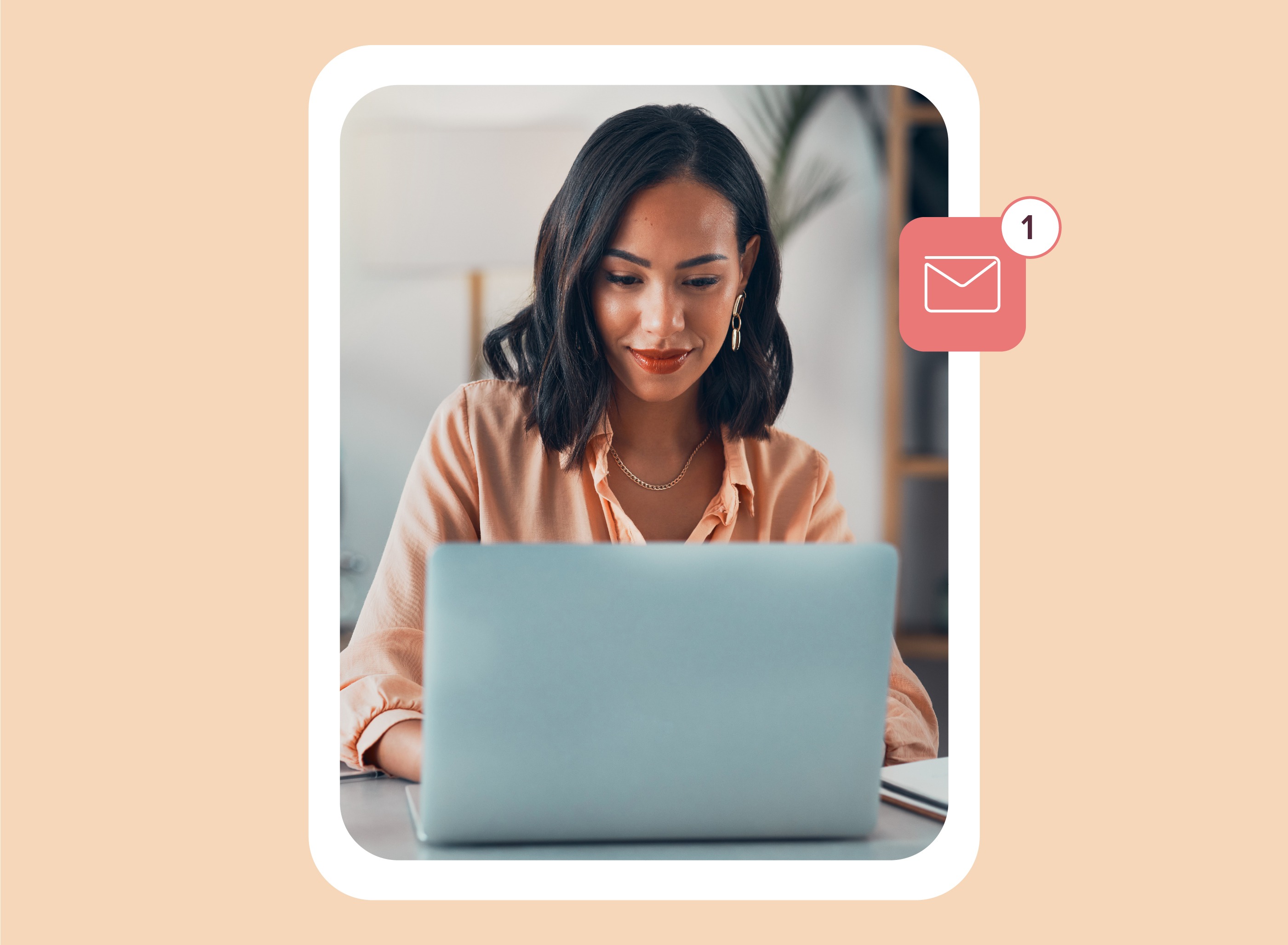 Woman working on a laptop with an email notification icon, representing email engagement or deliverability.